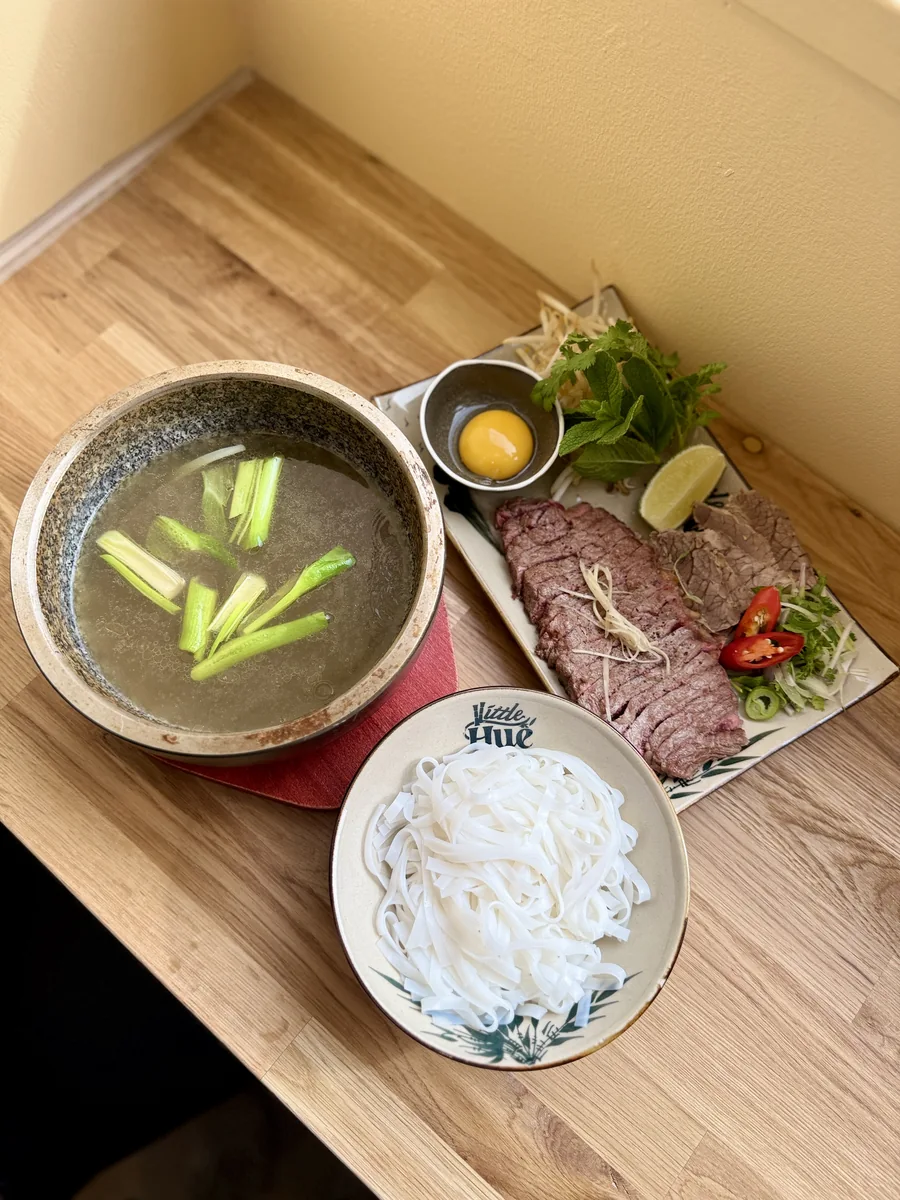 Signature hot stone pho presentation